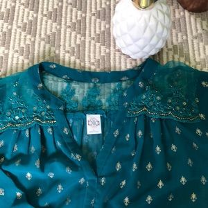 Blouse whit print in color gold size L